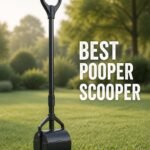 Long-handled pooper scooper standing on a sunlit lawn