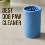Blue silicone dog paw cleaner cup on a light surface