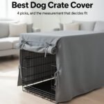 Wire dog crate fitted with a grey crate cover in a living room